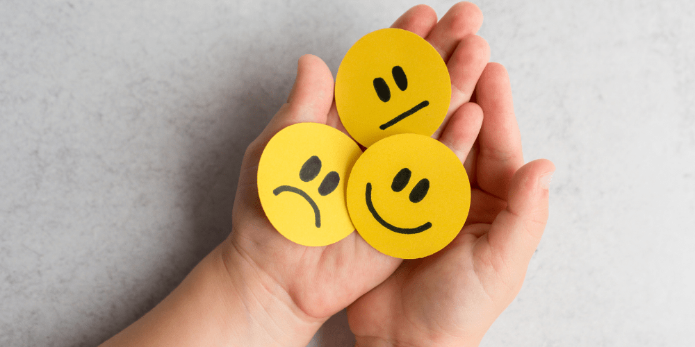 A kid holding their emotions in their hands